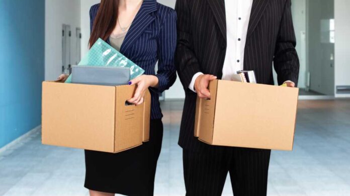 Fired,People.,Unemployed,Managers,With,Boxes,In,Hands.,Mass,Layoff