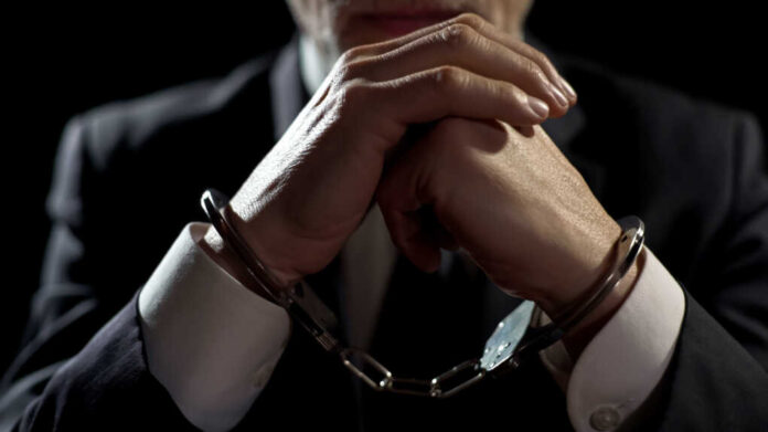 Upset,Handcuffed,Man,Imprisoned,For,Financial,Crime,,Punished,For,Serious