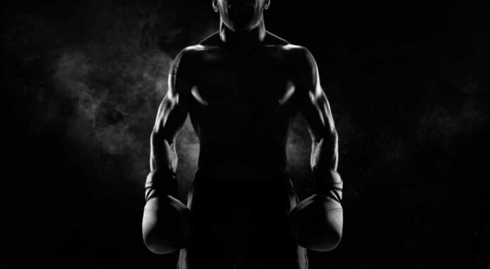 Noname,Image,Of,A,Kickboxer,On,A,Dark,Background.,The