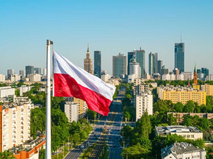 Polish,National,White,And,Red,Flag,Against,Skyscrapers,In,Warsaw