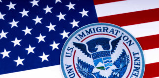 U.S. Immigration and Customs Enforcement badge on an American flag background