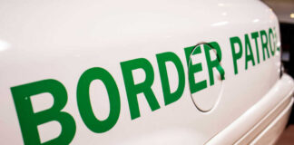 Close-up of a border patrol vehicle with green lettering