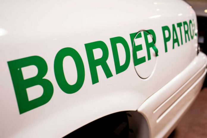 Close-up of a border patrol vehicle with green lettering