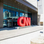 Exterior view of the CNN headquarters with a large red logo