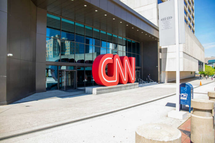 Exterior view of the CNN headquarters with a large red logo