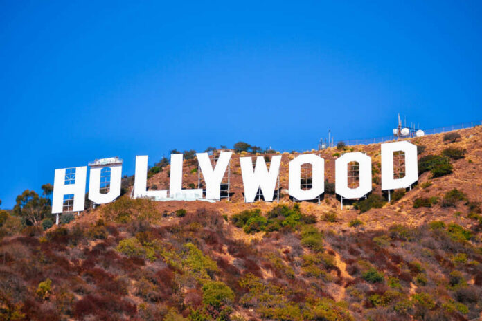 shutterstock2506002795jpg Hollywood sign on a hillside against a clear blue sky