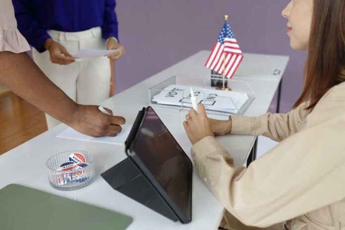 Individuals participating in the voting process at a polling station