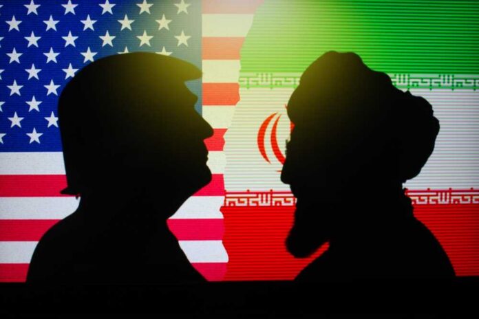 Silhouettes of two figures against the backgrounds of the American and Iranian flags