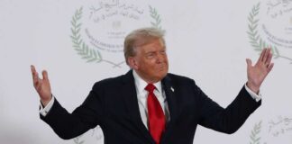 Donald Trump gesturing during a political event