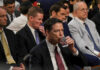 Florida Grand Jury Bombshell: 130 Subpoenas Issued A man in a suit drinking water during a congressional hearing