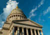 Close-up view of the dome of the West Virginia State Capitol against a blue sky