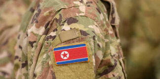 Close-up of a military uniform featuring the North Korean flag