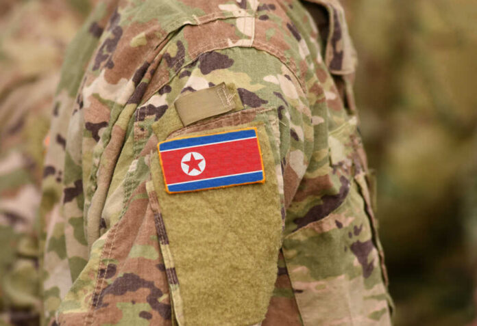 Close-up of a military uniform featuring the North Korean flag