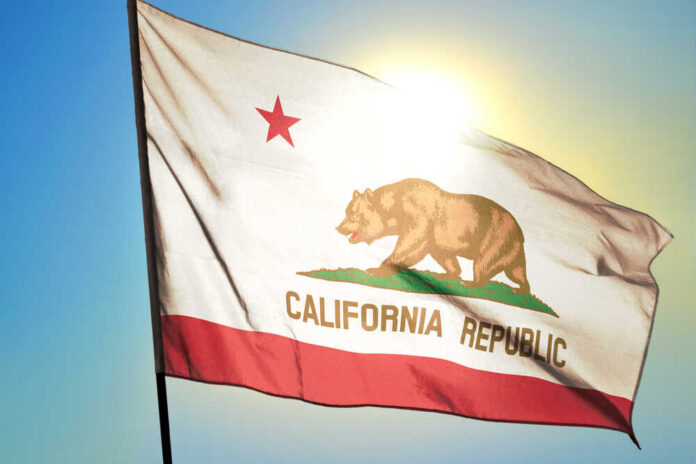 shutterstock_1948822210.jpg California state flag waving in the sunlight
