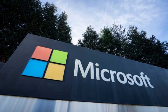 shutterstock_2422758857.jpg Microsoft logo displayed on a sign with colorful squares