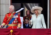 Members of the royal family gathered on a balcony at Buckingham Palace
