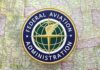 Federal Aviation Administration logo on a vintage map background