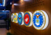 Display of military seals representing various branches of the U.S. Department of Defense