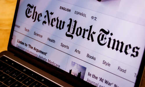 shutterstock_1308661753 (1).jpg Close-up of The New York Times website displayed on a laptop