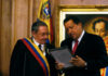 Shocking Indictment: Cuban Dictator Faces U.S. Justice Two officials examine a framed document during a ceremony