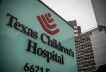 Texas Children's Hospital sign in front of modern buildings