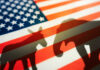 Republicans Cheer, Democrats Fear: Jobs Data Clash Shadows of a donkey and elephant on an American flag