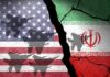 Iran Strike HALTED: Gulf Leaders Intervene A cracked wall featuring the flags of the USA and Iran with military aircraft silhouettes