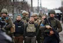 Street Clash Claims vs. Proof: Kostyantynivka Mystery A group of military personnel in tactical gear walking through an urban area