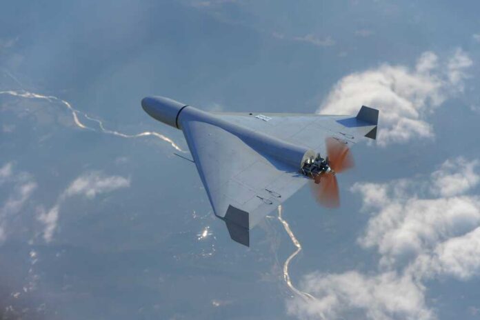 Top,View,Of,Russian,Army,Shahid,Combat,Drone,In,The A drone flying high above the clouds with a visible propeller