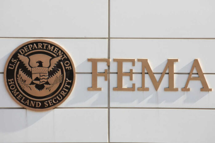 Signage of FEMA, U.S. Department of Homeland Security, displayed on a building