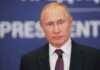 Russian Missiles Continue Deadly Civilian Toll man in suit speaking at a podium