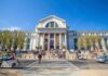 White House Targets Museum — Funding On The Line Neoclassical museum building with columns and busy entrance