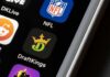 Smartphone screen showing NFL and DraftKings app icons