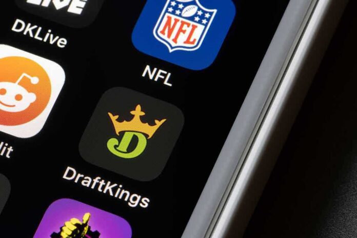 Smartphone screen showing NFL and DraftKings app icons