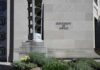 Billion‑Dollar Dragnet Targets Tariff Cheats Department of Justice building exterior with stone facade and plants