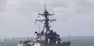 A naval destroyer sailing in the ocean