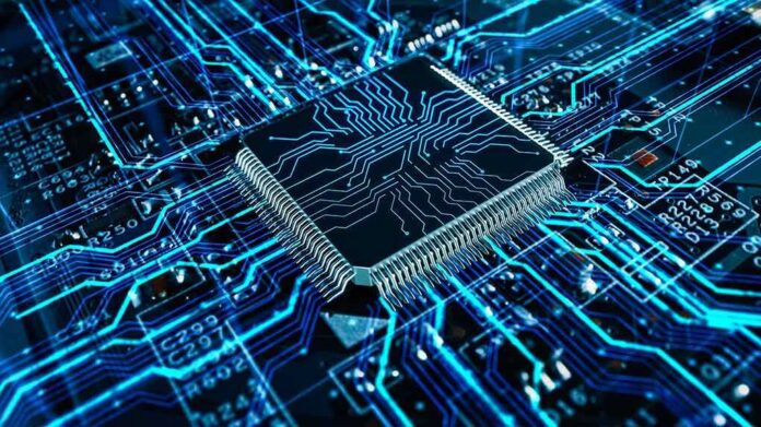 shutterstock_2198551397 Microchip on a glowing blue circuit board
