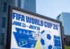 Red Card Reversed After Trump Intervention FIFA World Cup 26 poster with soccer ball in urban setting