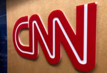 Deportation Math Stuns CNN CNN logo on a wall