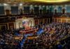 legislative chamber filled with seated members during a session