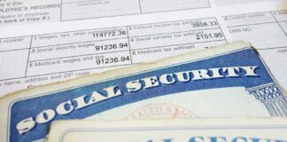Social Security cards on top of a tax form