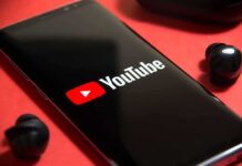 FTC Targets YouTube: Rulebook on Trial smartphone displaying YouTube logo on red background