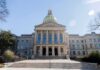 Trump Plan Ignites Stateside Showdown State capitol building with gold dome and columns