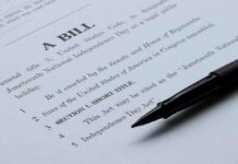 Abortion Until Birth? Beacon Hill’s Gambit Bill document with black pen on paper