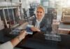Israel Slams Door on EU Critics airport check-in agent handing back a passport