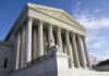 Judge Freezes Illinois Mandate For Nuns Supreme Court building with Corinthian columns