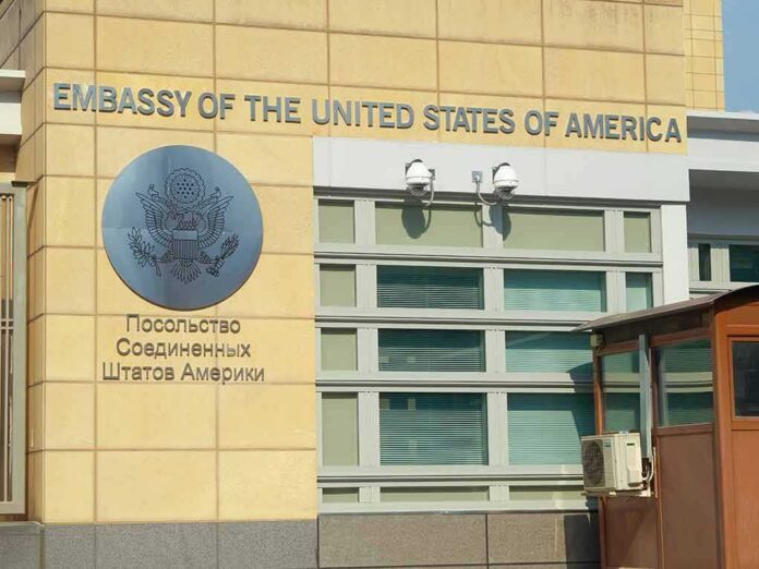 shutterstock_1180000336 United States Embassy exterior with signage and seal