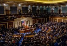 Congress Pokes Supreme Court — Birthright On Trial legislative chamber filled with seated delegates