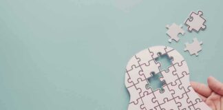 human head puzzle silhouette with missing pieces