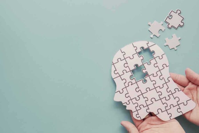 shutterstock_1814268452 human head puzzle silhouette with missing pieces